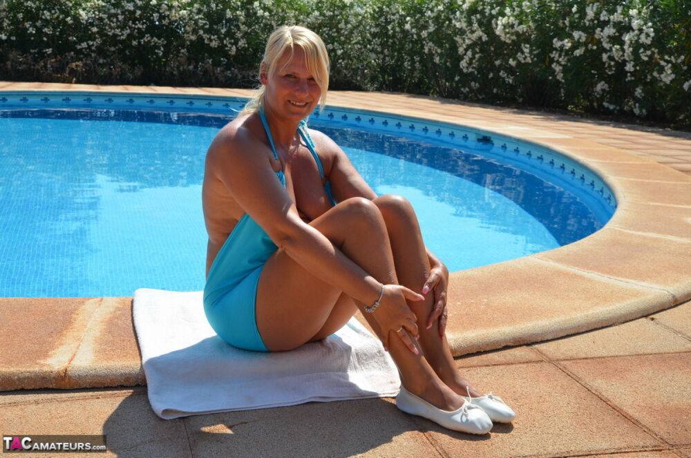 30 plus blonde Sweet Susi masturbates on a towel next to a swimming pool - #5