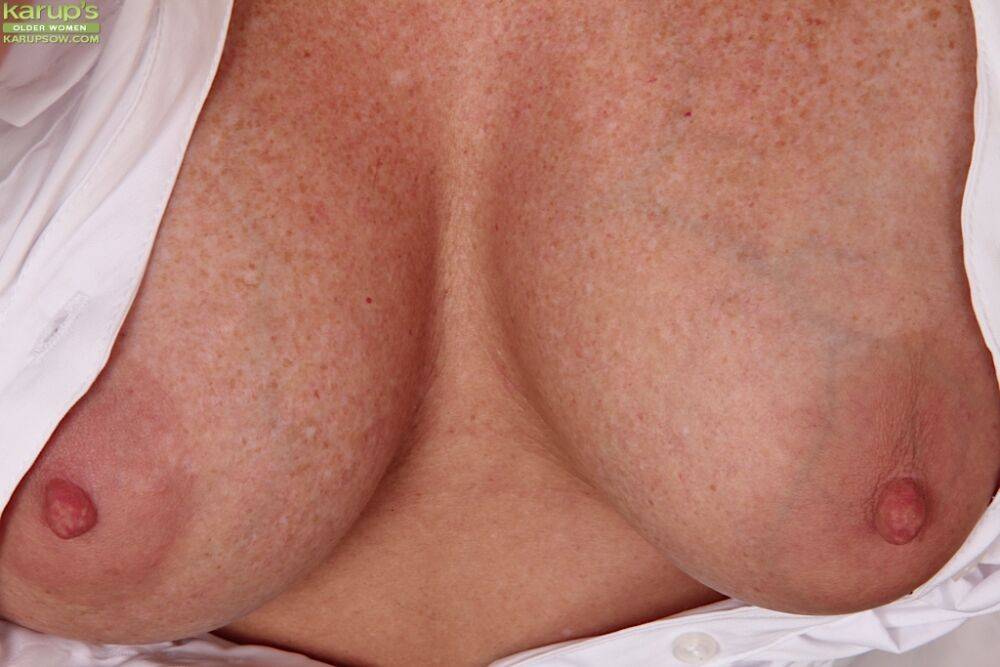 Redhead milf Brandie Jones with big tits and mesmerizingly hot ass - #14