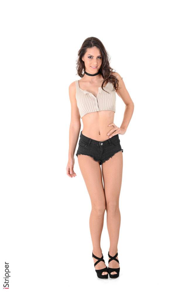 Leggy Latina girl Carolina Abril wears a black choker during a striptease - #9