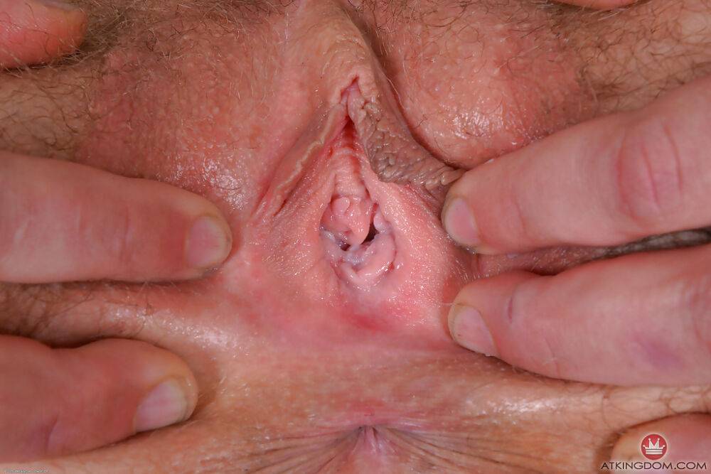 Older hirsute lady Leona spreading pink pussy for clitoral stimulation - #9