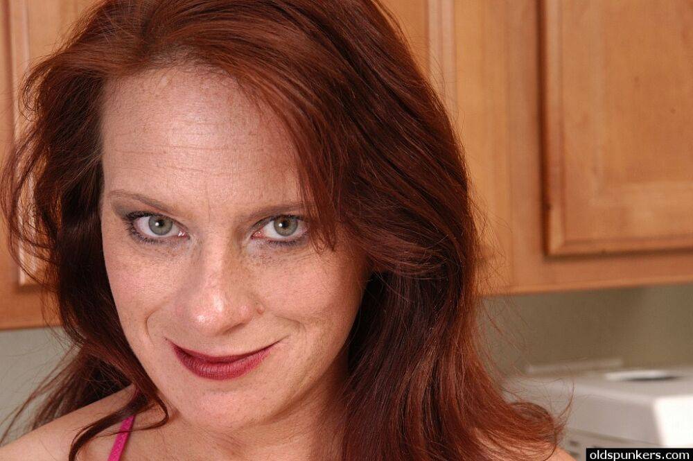 Older woman Tasia spreading her pink pussy lips in the kitchen - #6