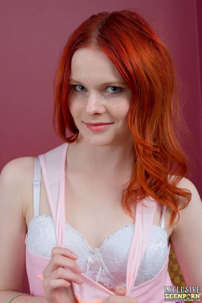 Young redhead Doreen fingers her pink pussy during close-up action - #5