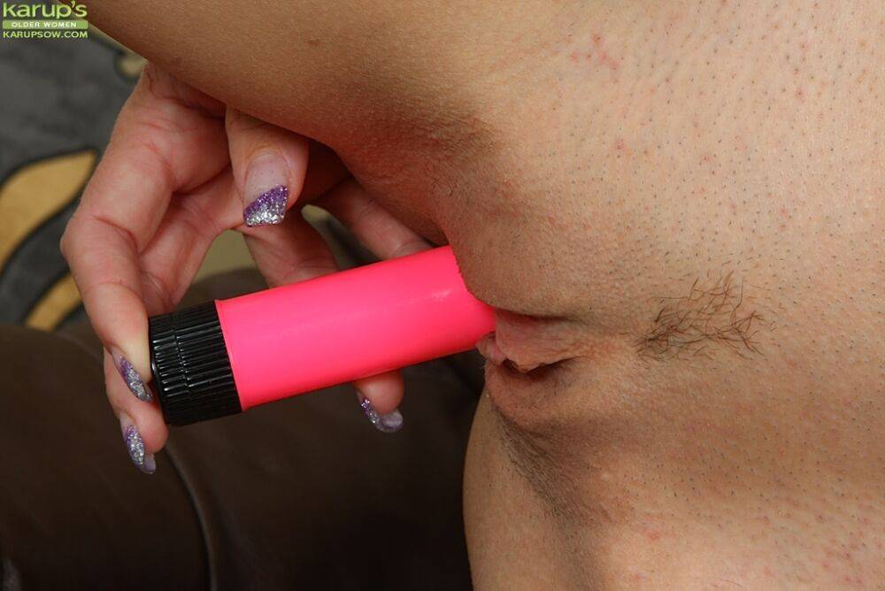 Voluptuous blonde MILF with tiny tits playing with a pink vibrator - #7