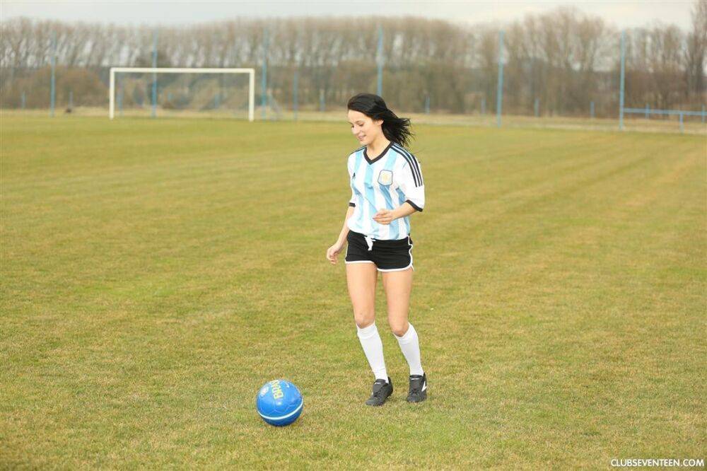 Barely legal soccer player removes her uniform before masturbating on a bench - #10