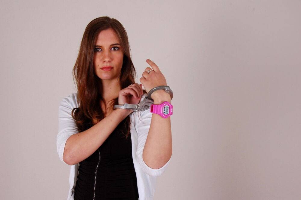 Redheaded amateur Stacey models a G-Shock watch and LIPS handcuffs in jeans - #9