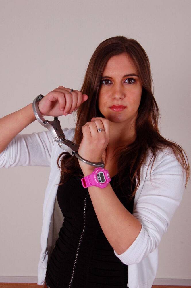 Redheaded amateur Stacey models a G-Shock watch and LIPS handcuffs in jeans - #10