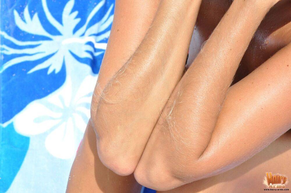 Amateur model Lori Anderson shows her hairy arms during a series of closeups - #3