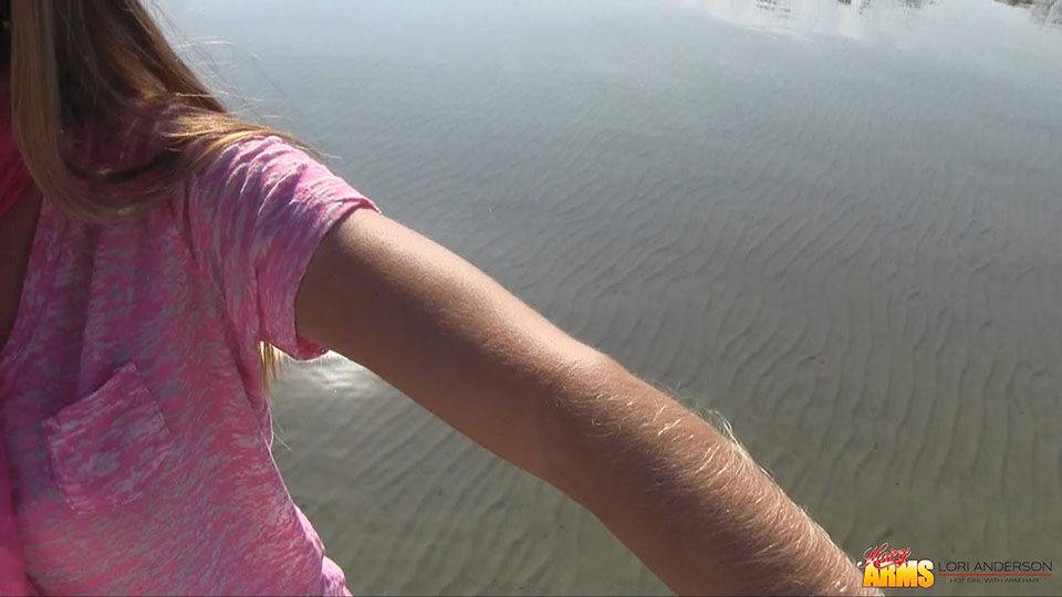 Amateur chick Lori Anderson shows off incredibly hairy forearms by the water - #11