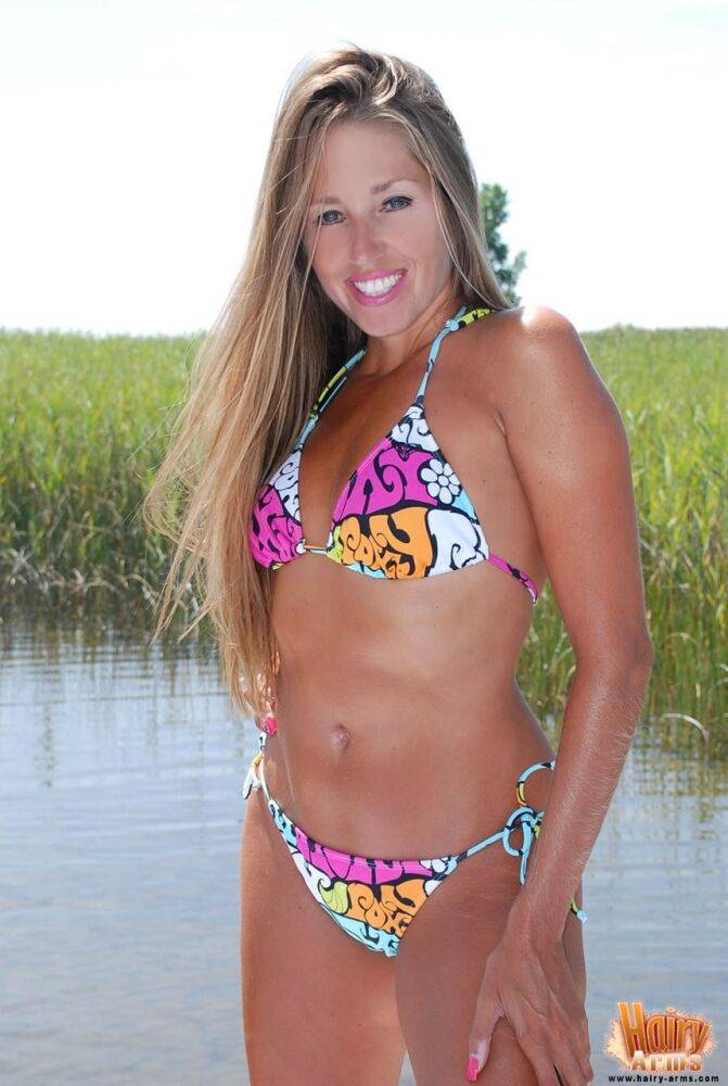 Amateur model Lori Anderson takes off her bikini near marshy waters - #9