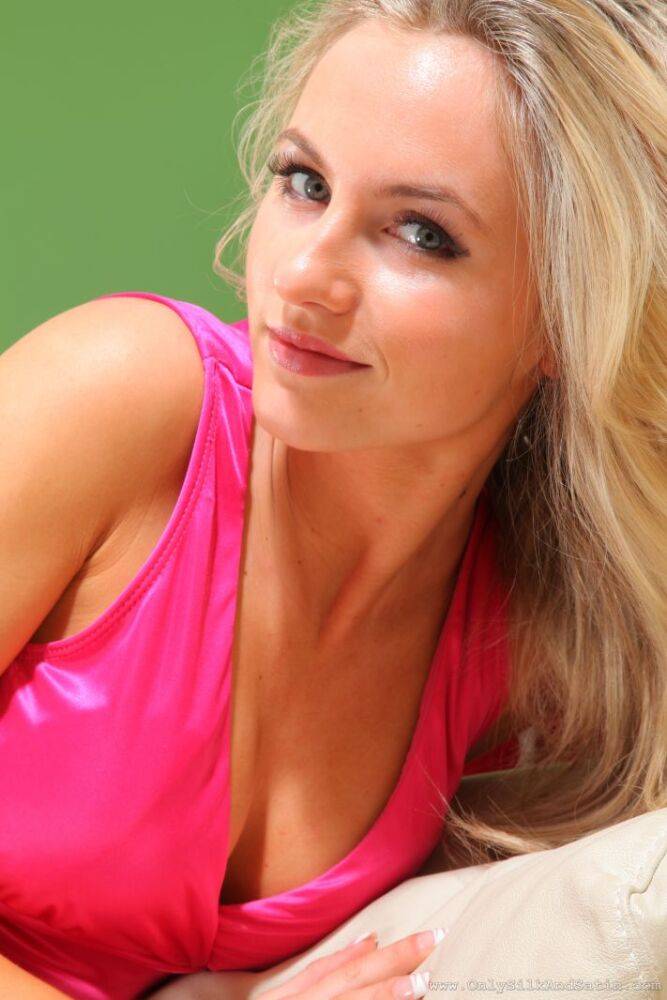 Blue-eyed blonde Natasha Anastasia doffs a pink dress to go topless in nylons - #14