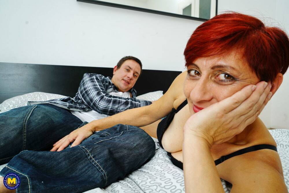 Short haired older redhead gets banged on a her bed by her younger lover - #2