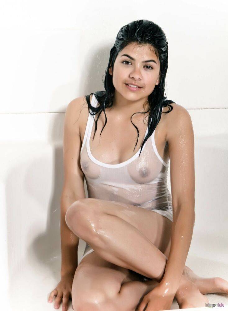 Indian solo girl peels off her white and quite see thru clothes in the shower - #12