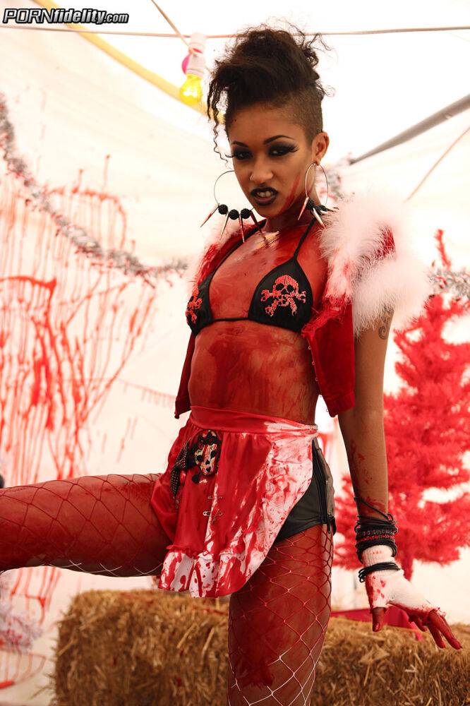 Ebony girl Skin Diamond wields a chainsaw before fucking a white guy in a tent - #14