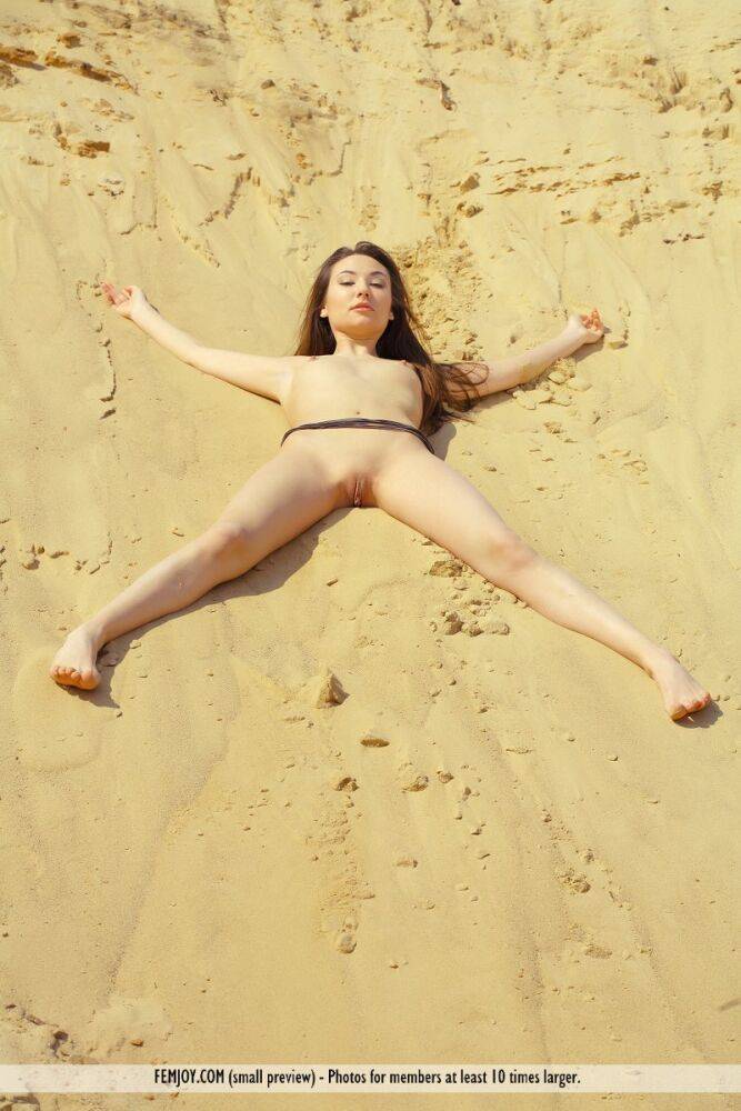 Solo model Martina D strikes great nude poses on a sandy hillside - #12