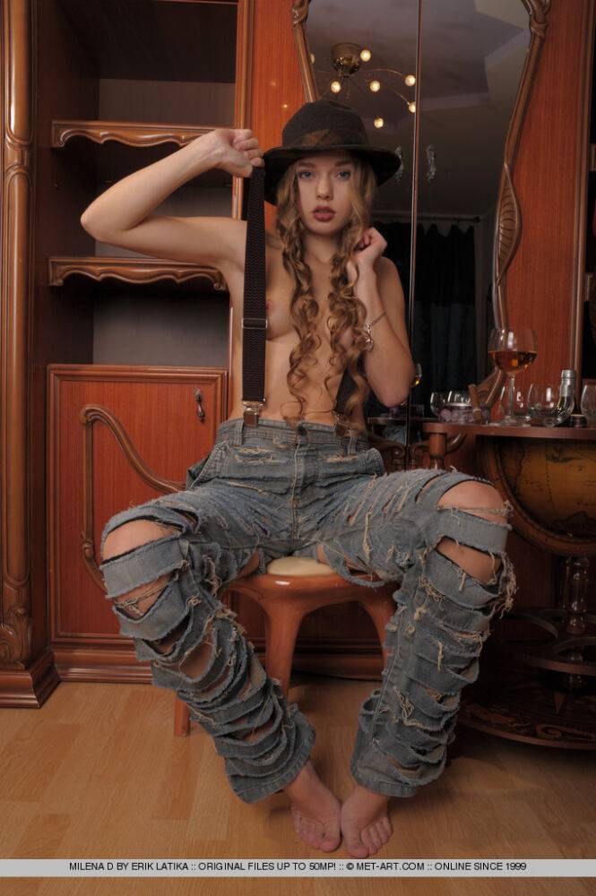 Charming teen Milena D works clear of ripped jeans to pose naked in a Fedora - #15