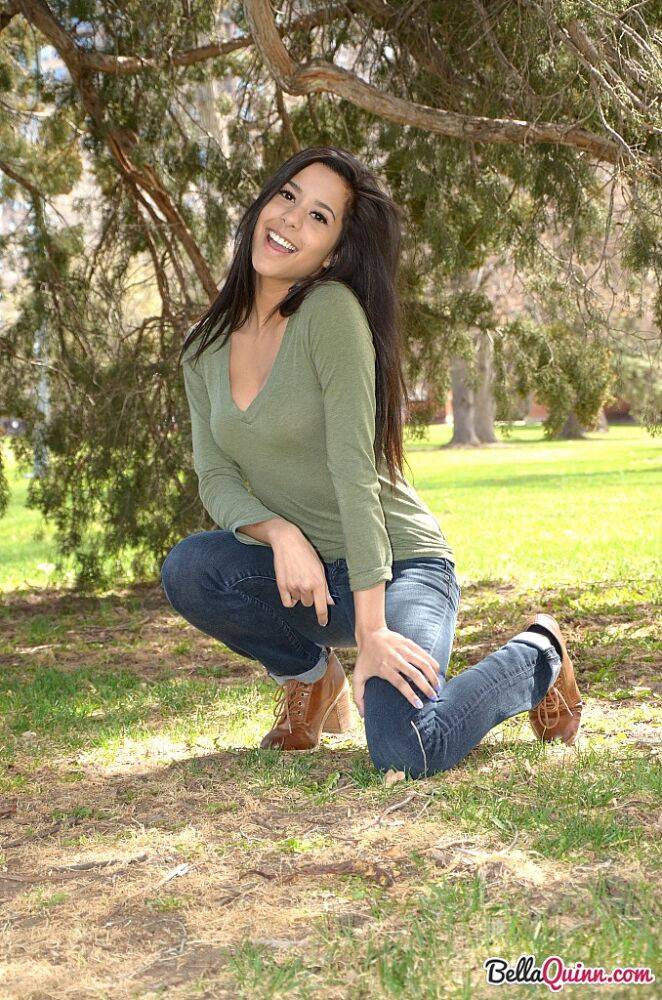 Latina chick Bella Quinn climbs a tree in the park wearing a sweater and jeans - #8