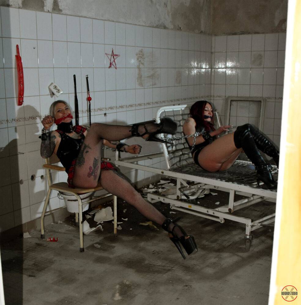 Clothed models are gagged and restrained in an abandoned hospital building - #7