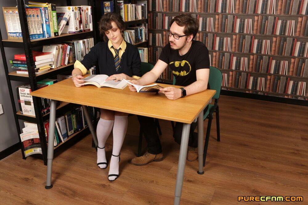 Nerdy women strip and jerk off a fellow nerd in the library - #11