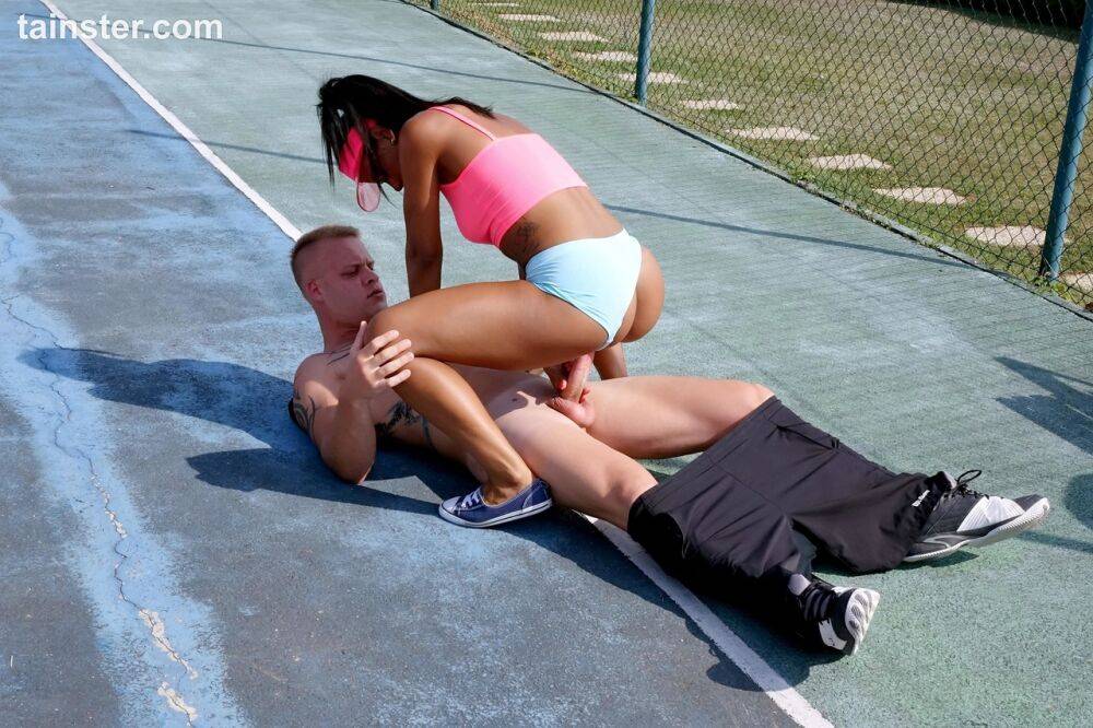 Brunette tennis players has sex on the court in a sports bra and sun visor - #3