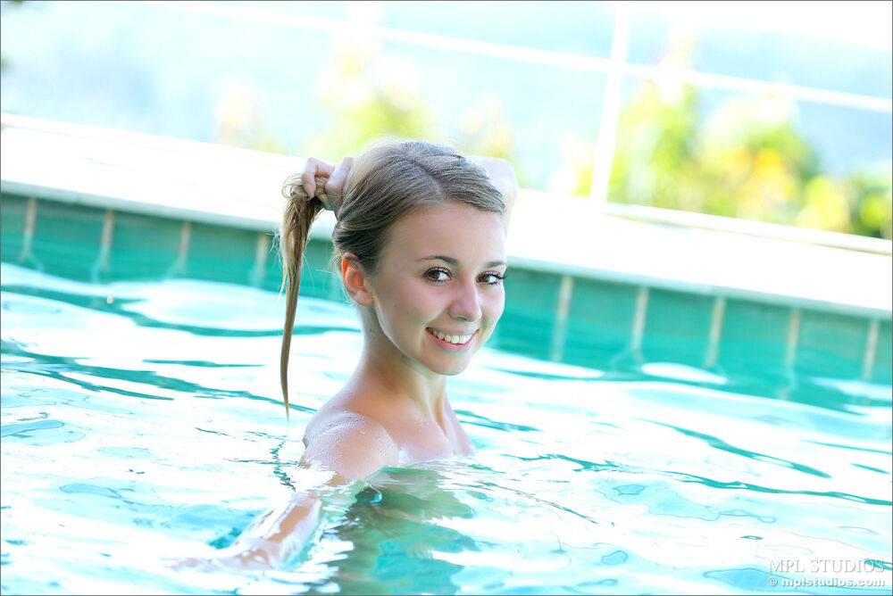 Sweet young cutie showing off her wet booty and small boobs in the pool - #12