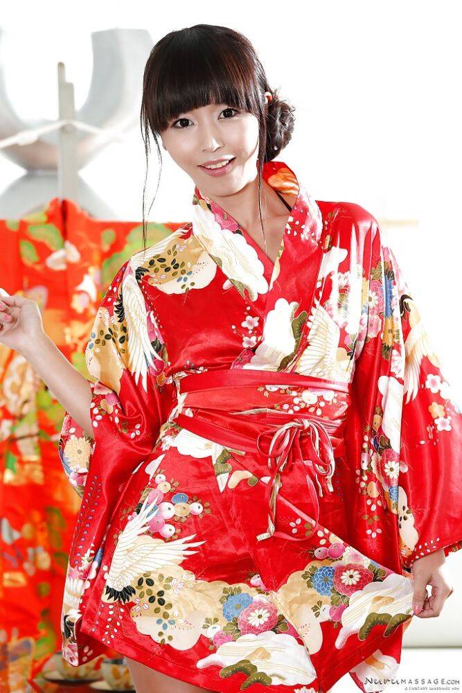 Japanese babe Marica Hase does a slow striptease out of Geisha uniform - #9