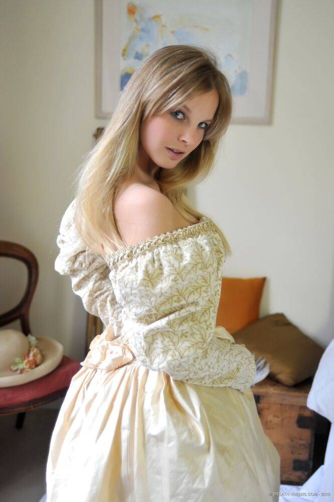 Blonde girl Rose takes off her petticoat to model in a girdle and nylons - #5