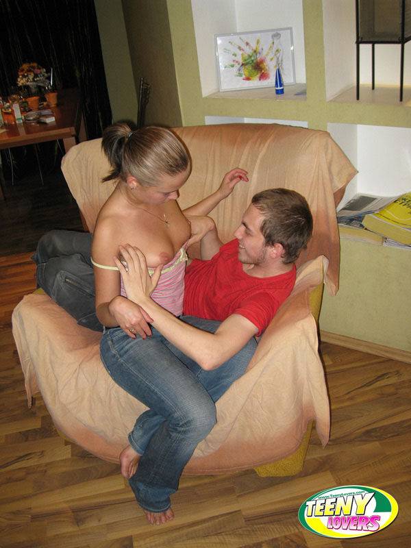 Horny teens make out while getting naked for a fuck on a comfy chair - #5