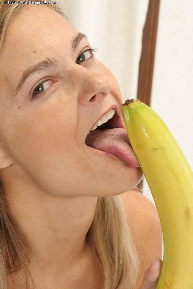 Naked amateur MILF Alanna fondles huge nipples while toying with a big banana - #10