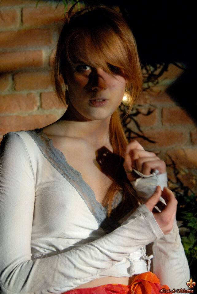 Natural redhead Lina exposes her upskirt underwear while in a garden setting - #14