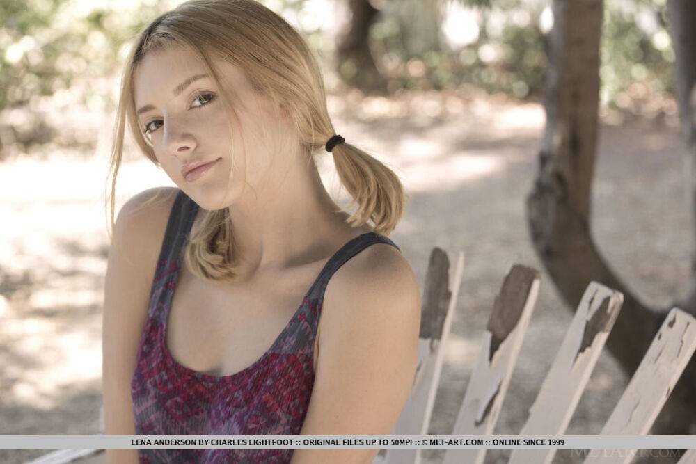 Teen first timer Lena Anderson vaunts her lithe body under a tree outside - #7