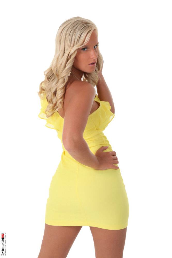 Blonde chick Miela works clear of a yellow dress to model naked in heels - #3