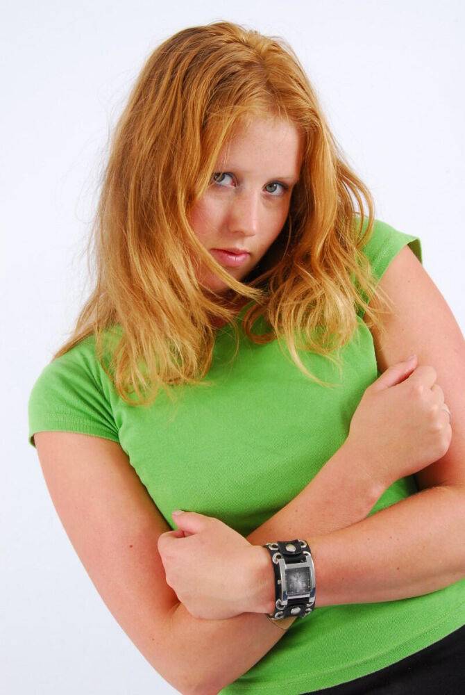 Natural redhead Judy models a double buckle cuff watch during SFW action - #6