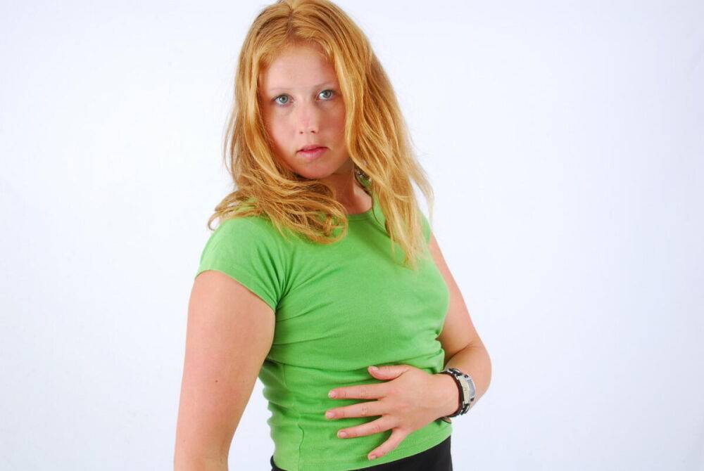 Natural redhead Judy models a double buckle cuff watch during SFW action - #2