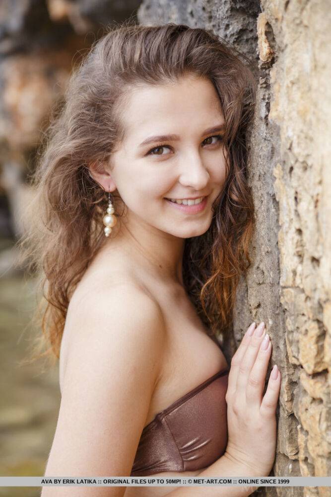 Teen solo girl Ava takes off a bikini to pose naked inside a sea cave - #16