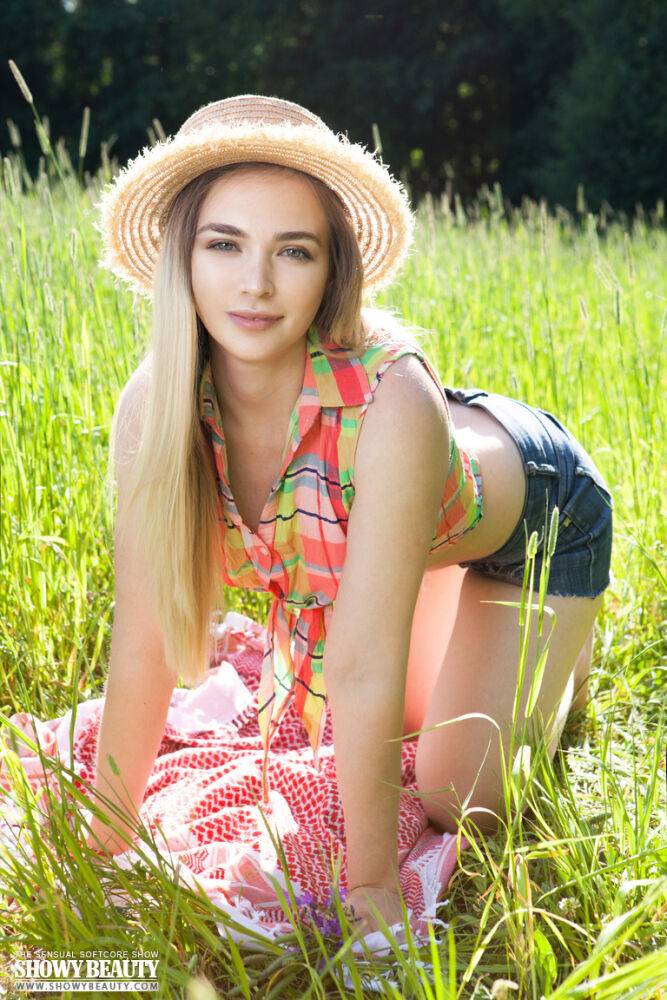 Teen first timer removes straw hat and clothes to model naked in a hay field - #6