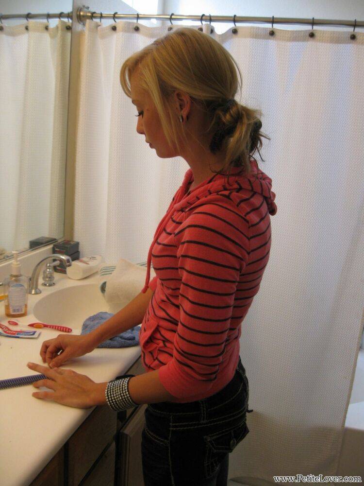 Young blonde girl Tiff fixes her hair while sporting a whale tail - #16