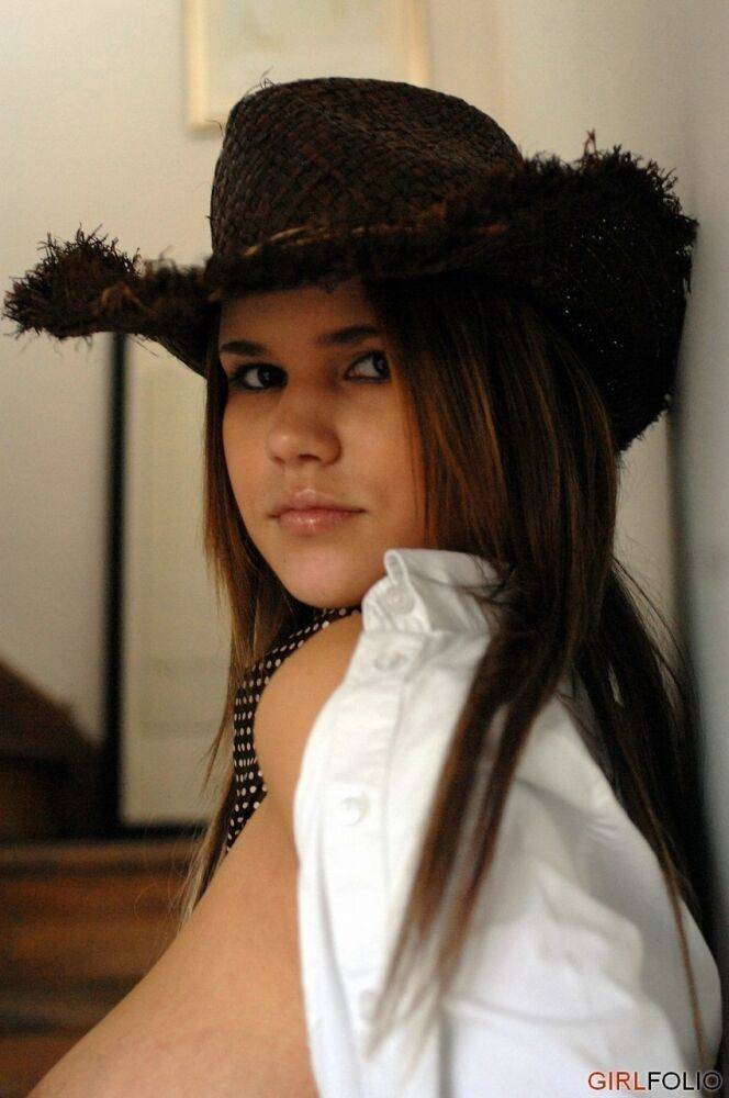 Solo girl shows off her big natural tits in a straw hat and cowgirl boots - #2