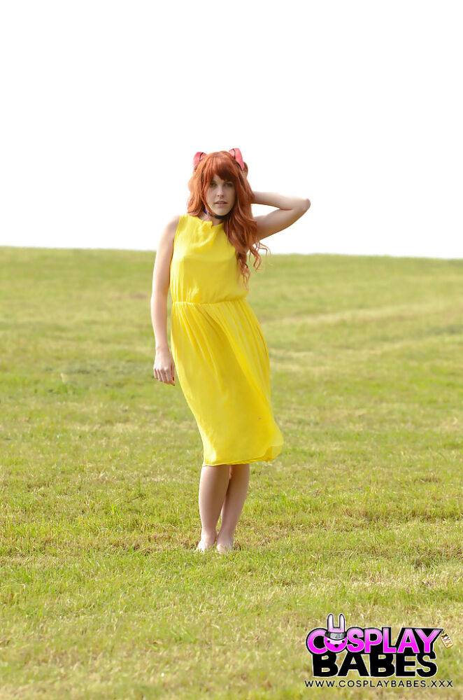 Amarna Miller poses in a beautiful yellow dress while outside - #8