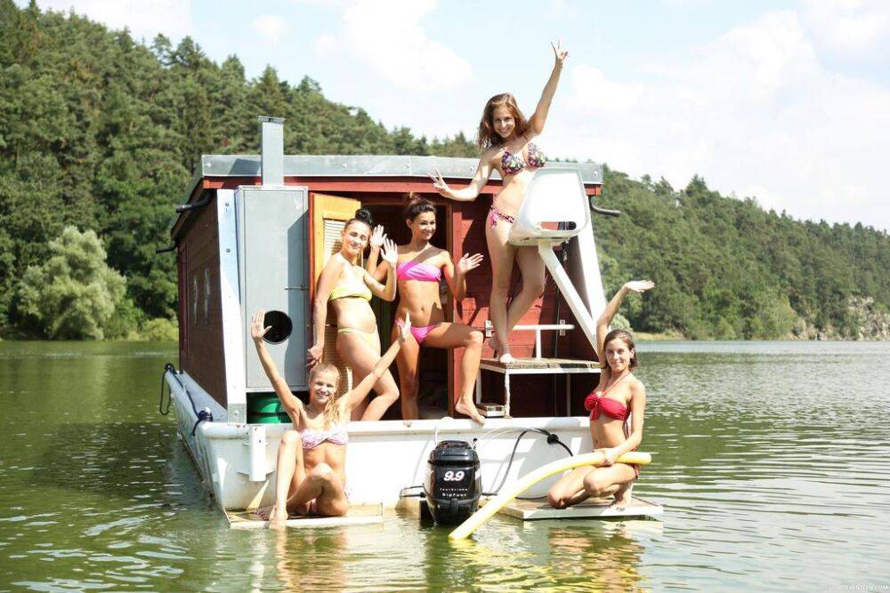 A group of teenage girls go rafting on a river in the nude - #13