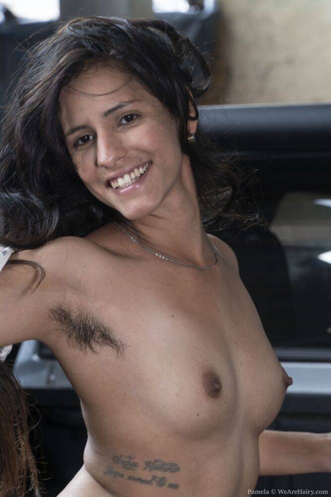 Amateur girl displays her hairy underarms and beaver in the bed of a pickup - #11