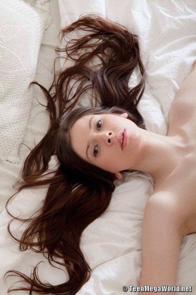 Sweet teen Lily whips her long hair about on a bed while naked in socks - #11