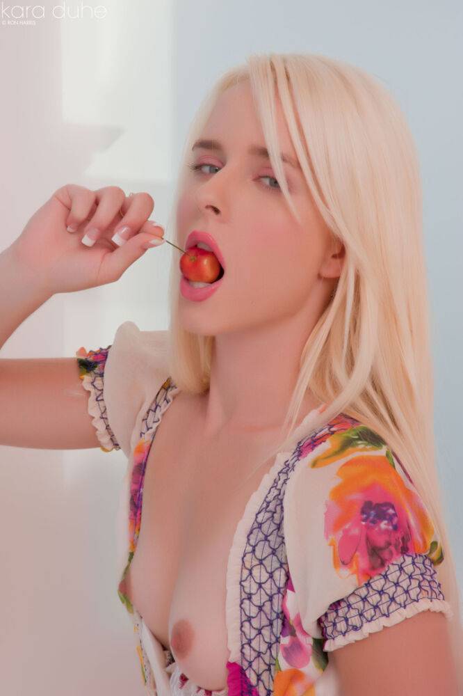 Hot blonde girl Kara Duhe hows her tiny tits while eating a cherry - #8