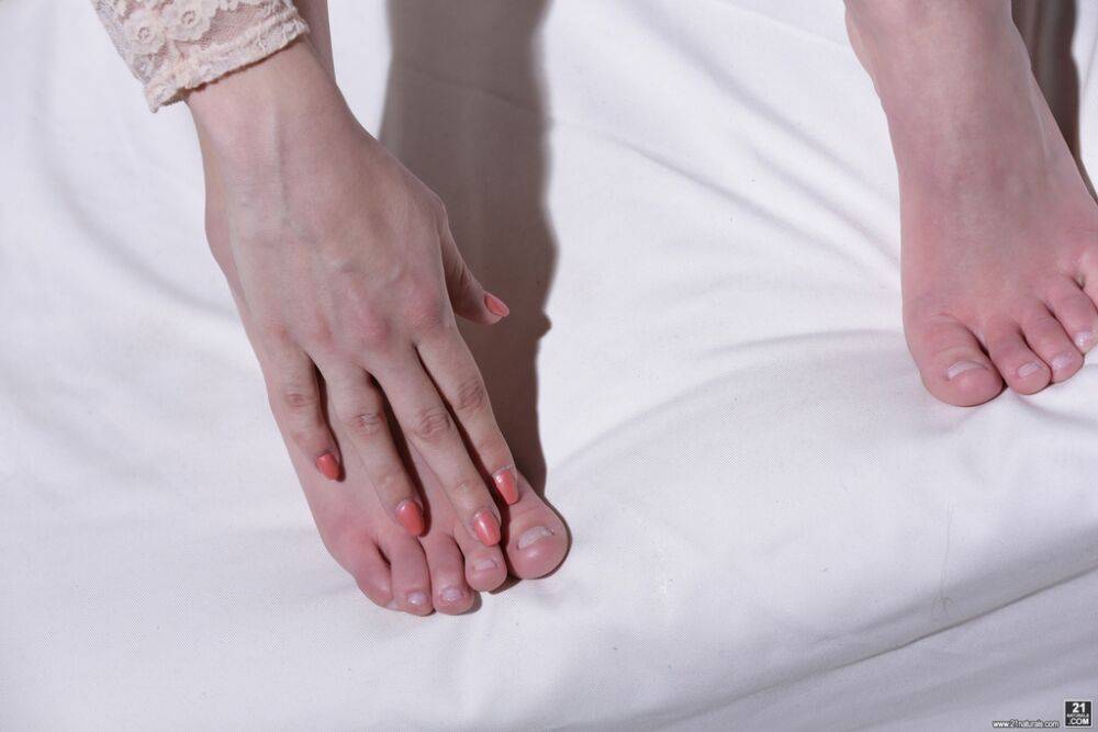 Bare legged solo model Lulu Love shows off her pretty feet in a onesie - #15