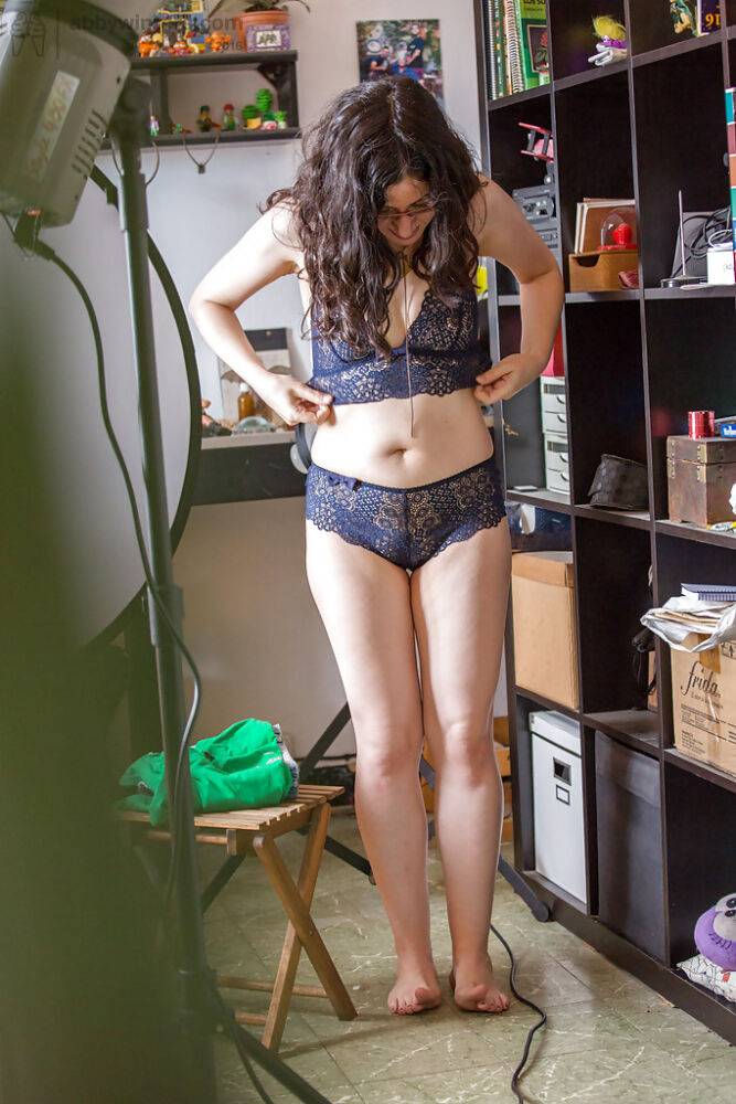 Brunette first timer Irene A covering naked body with lingerie and shorts - #9