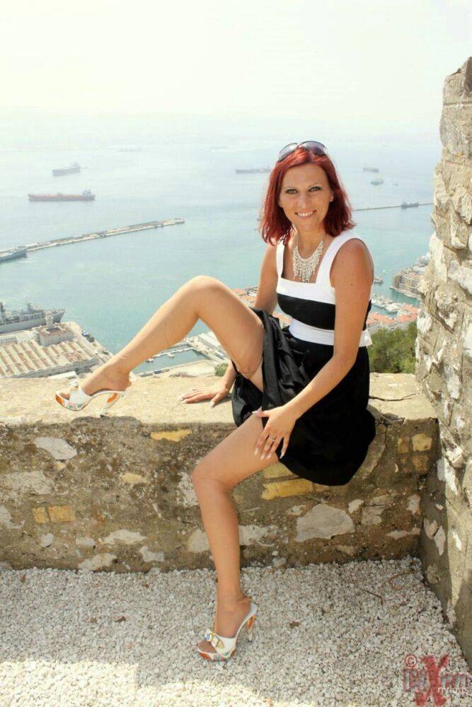 Solo girl flashes a no panty upskirt in nylons while on vacation in Gibraltar - #4