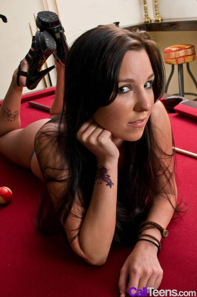 Young brunette Meghan gets naked in heels on top of a pool table - #9