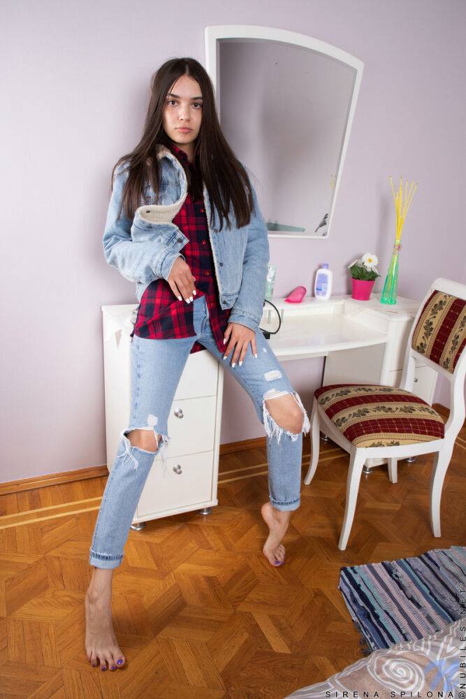 Dark haired teen Sirena Spilona removes ripped jeans to get naked in a bedroom - #3