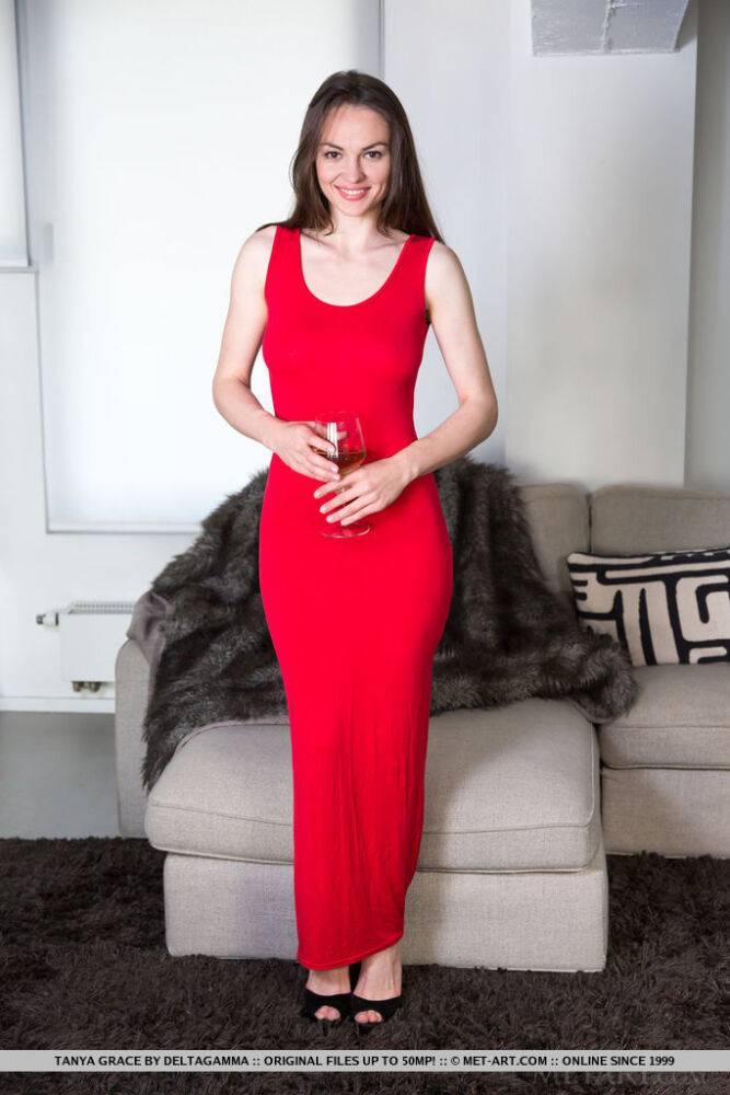 Solo girl Tanya Grace removes a red dress and ankle strap heels to pose naked - #4