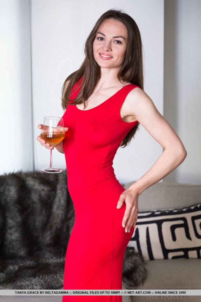 Solo girl Tanya Grace removes a red dress and ankle strap heels to pose naked - #7
