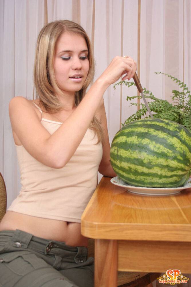 Angelic teen strips off her clothes to pose nude while eating a watermelon - #14